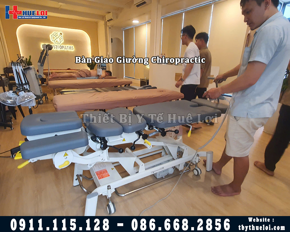 bàn giao giường chiropratic